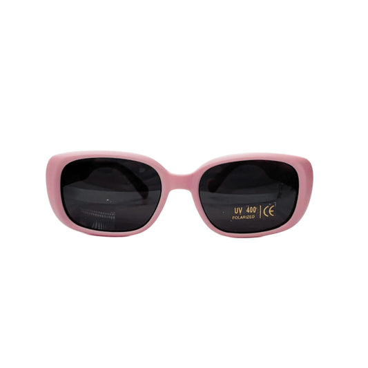 front view of kids UV polarised coral pink sunglasses