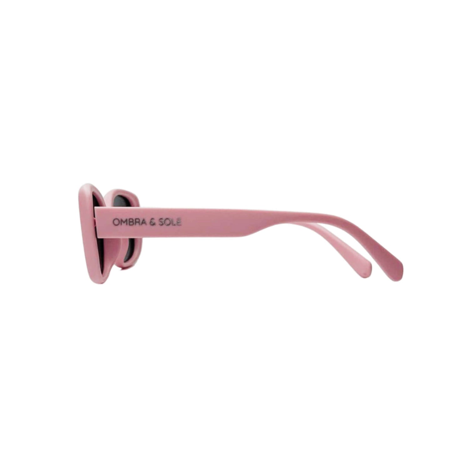 Side view of kids UV polarised coral pink sunglasses showing flexible arms