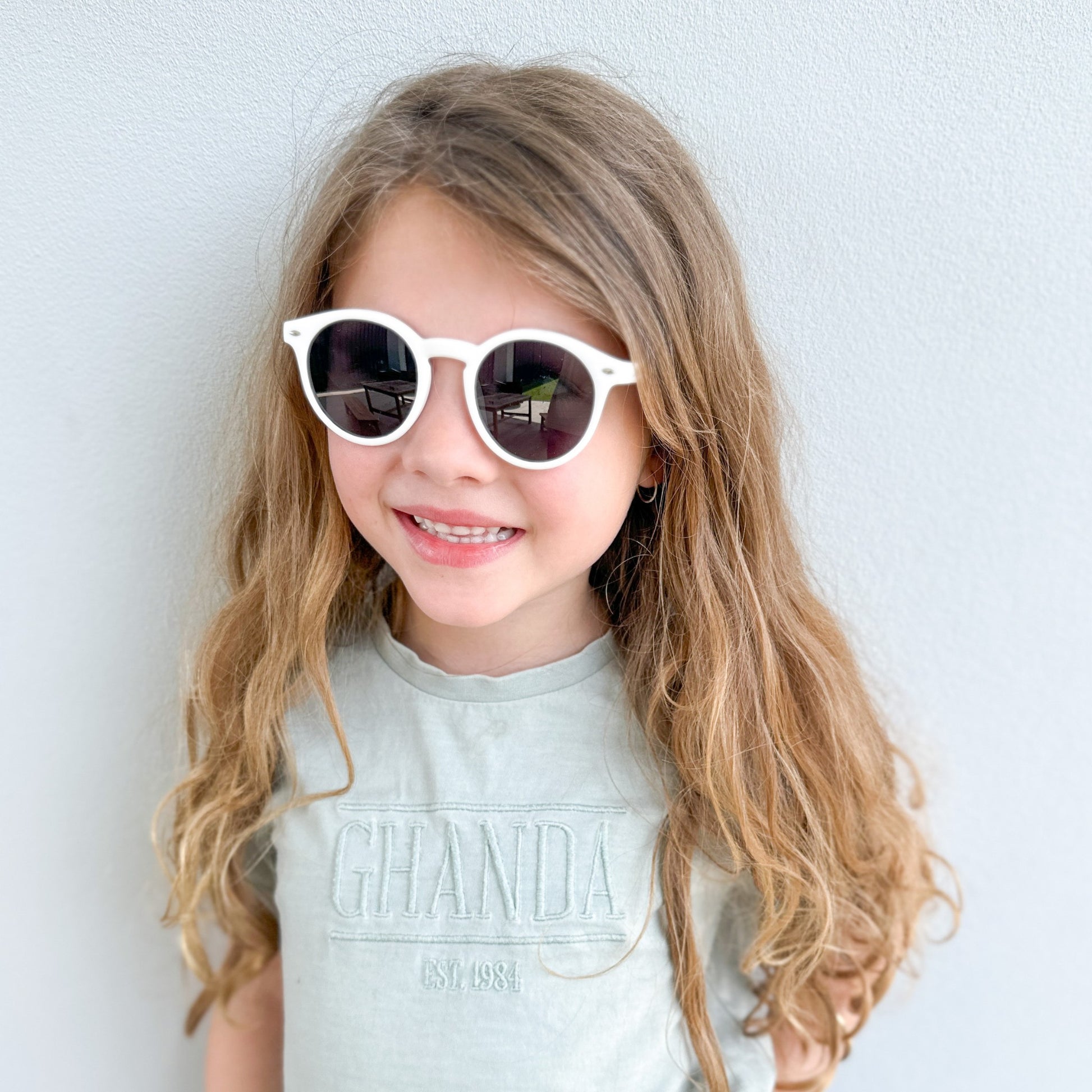 girl wearing flexible white UV Polarised Sunglasses