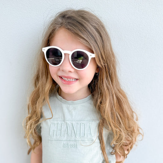 girl wearing flexible white UV Polarised Sunglasses