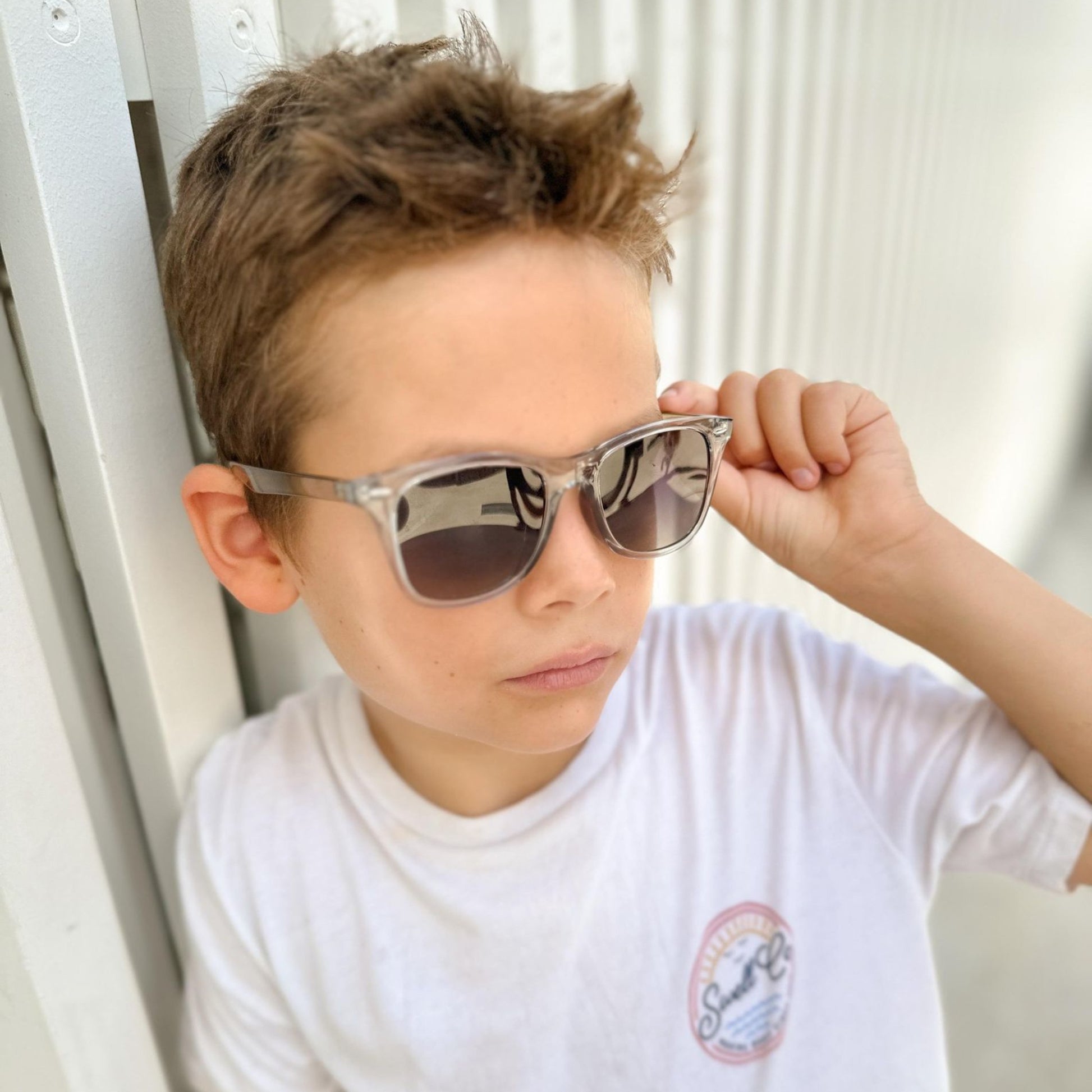 kid talent wearing clear two tone UV Polarised frames