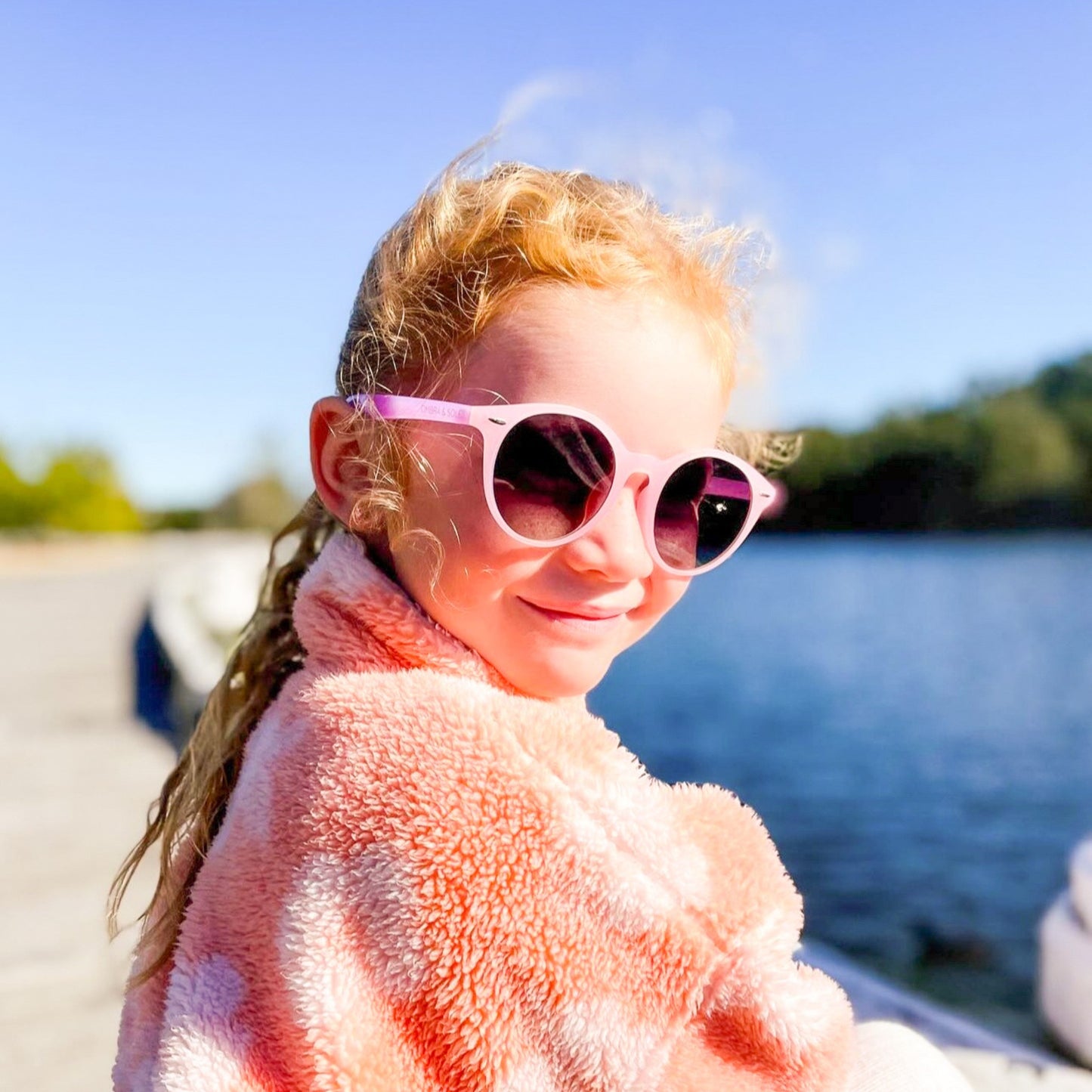 child wearing Pink sunglasses UV Polarised